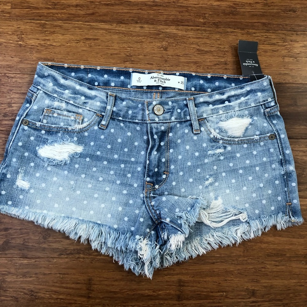 Abercrombie and Fitch mid-rise polka dot jean shorts with fringe